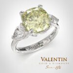 4766 cushion and 2 pear diamond ring