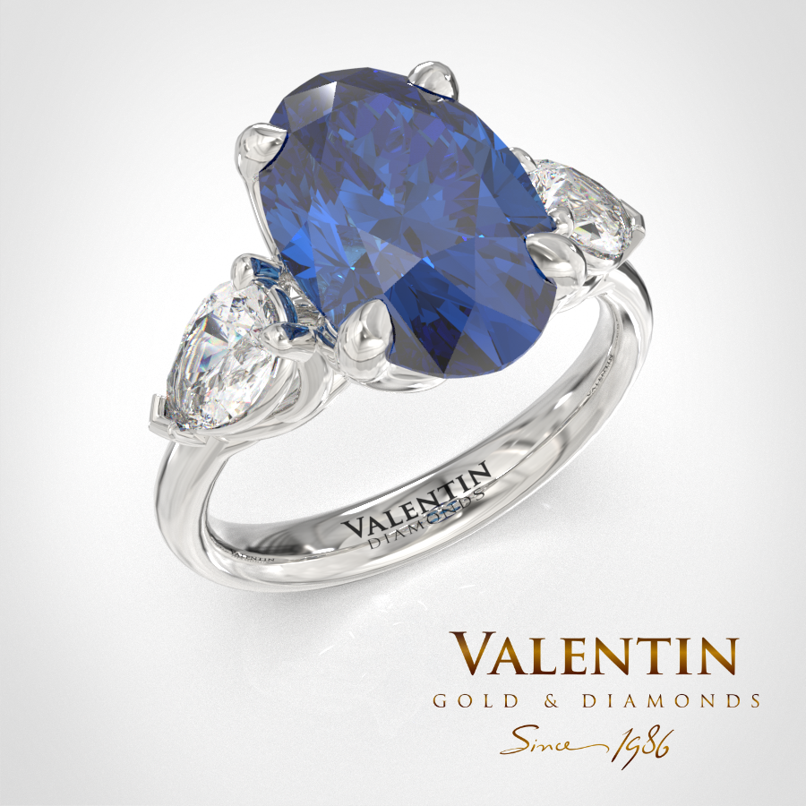 Oval sapphire and 2 pear ring